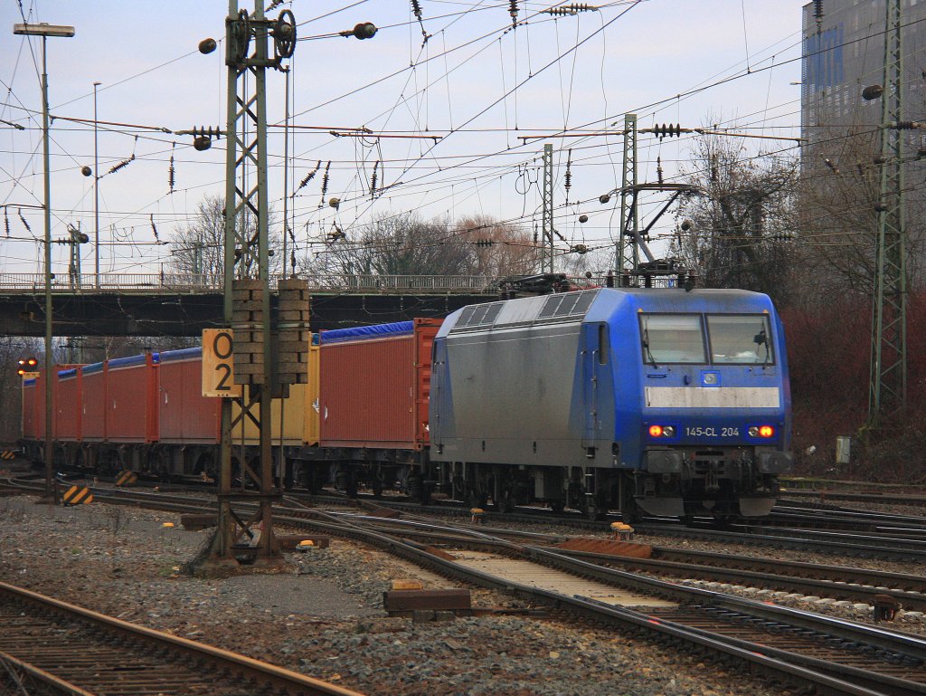 Eine 145 CL-204 von Crossrail als Schubhilfe fr einen sehr langen Containerzug in Richtung Belgien bei Abendstimmung am 21.2.2012.
Aufgenommen  in Aachen-West.