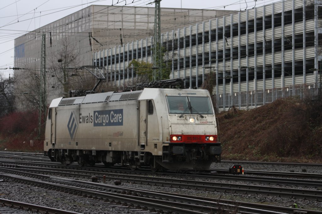 Eine 185 581-6 von Ewals Cargo Care fhrt als Lokzug von Aachen-West nach Herzogenrath.
27.2.2011