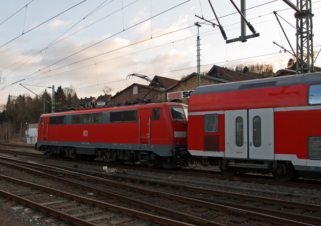 Eine Lok mit einer Schnapszahl: 111 111-1 mit dem RE 9 (Rhein-Sieg-Express) Aachen - Kln - Siegen am 04.02.2012 kurz vor der Einfahrt in den Bahnhof Betzdorf/Sieg.