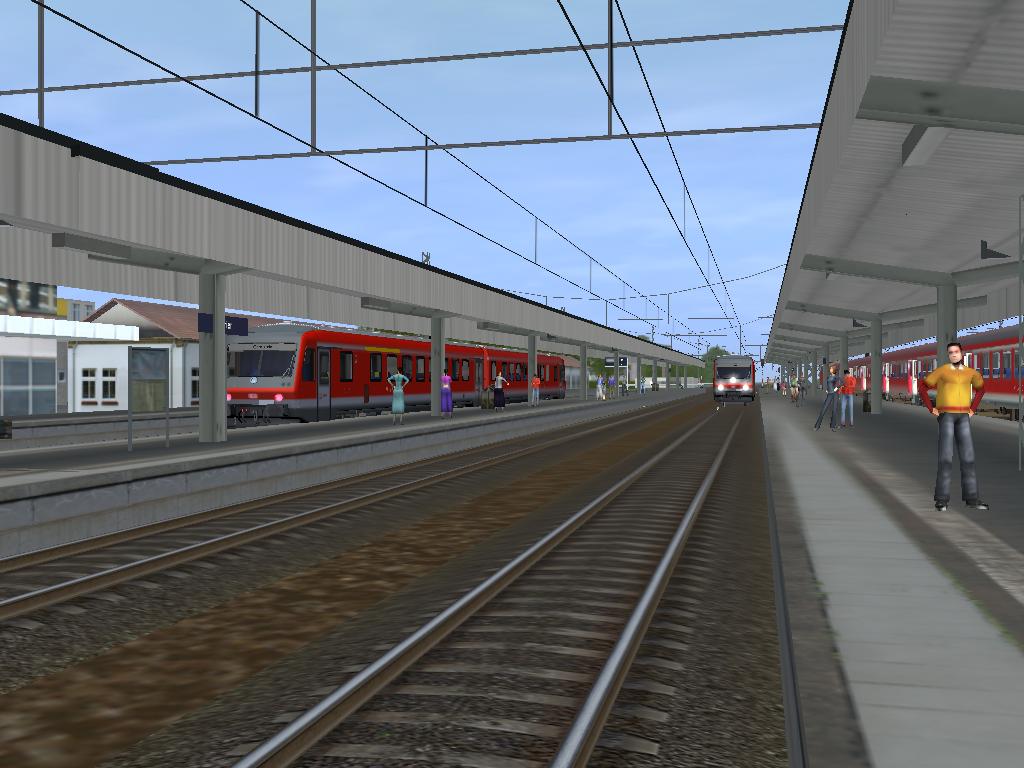 Eine Regionalbahn(links)nach Gerolstein steht im Trierer Hbf whrend in der  Mitte eine RB aus Gerolstein kommt