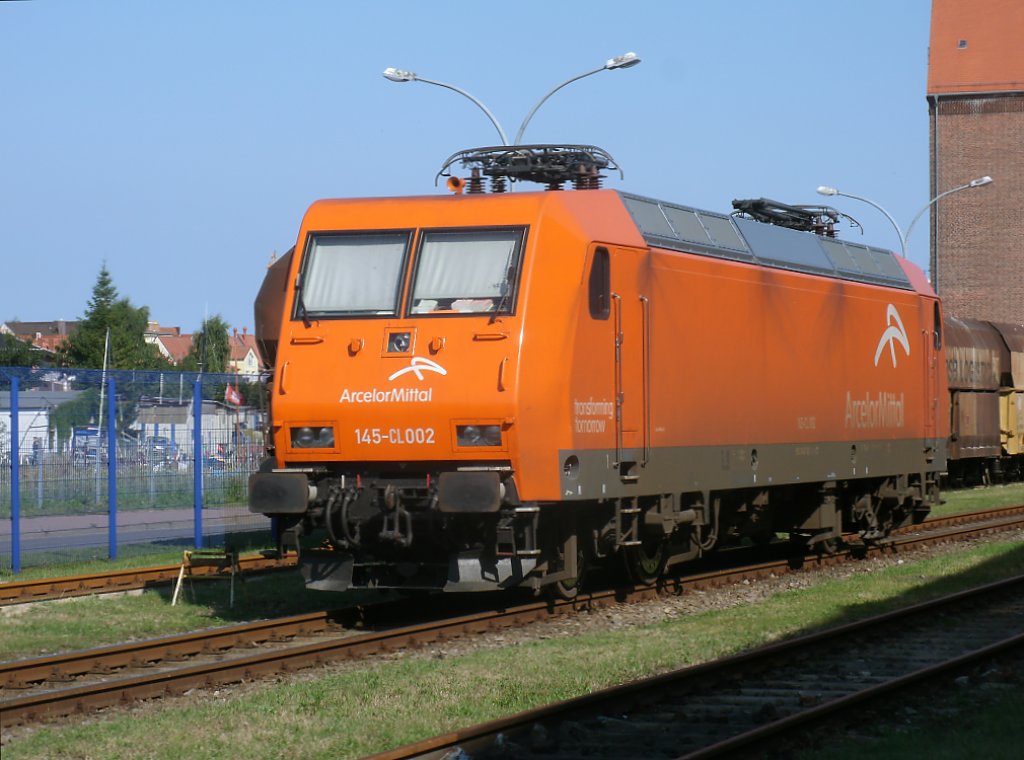 EKO Trans 145-CL002,am 10.August 2013,aufgenommen durch das Hafentor im Stralsunder Nordhafen.
