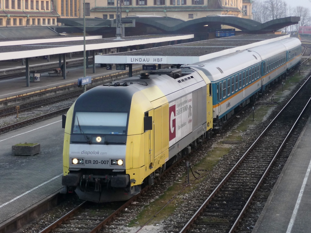 ER 20-007 wartet mit einem Alex in Lindau HBf (Insel) auf Abfahrt (5.3.11), aufgenommen von der Fugngerbrcke...