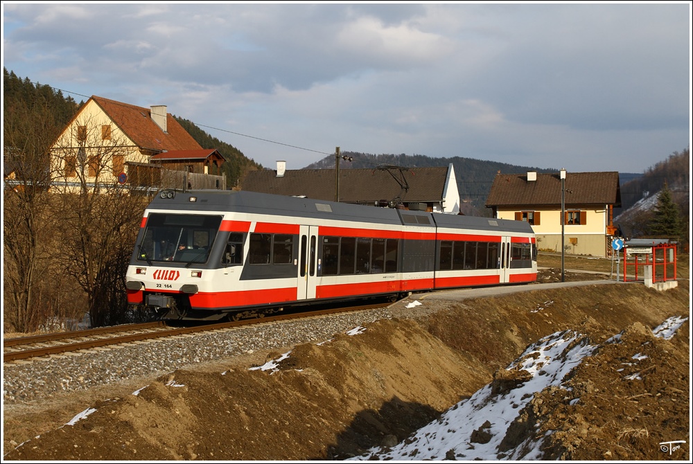 Ersatztriebwagen LILO ET 22 164 fhrt auf der belbacherbahn als R 8775 von Peggau nach belbach. 
Guggenbach-Pulverwerkssiedlung 25.2.2011
