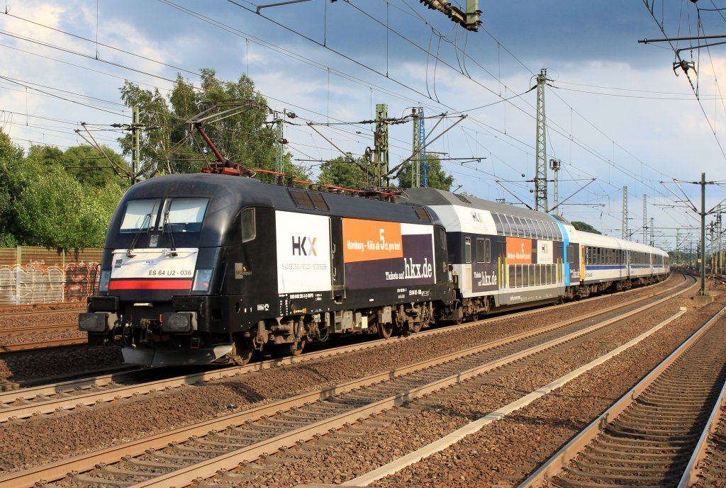 ES 64 U2 - 036 mit einem HKX am 31. Juli 2013 in HH-Harburg.