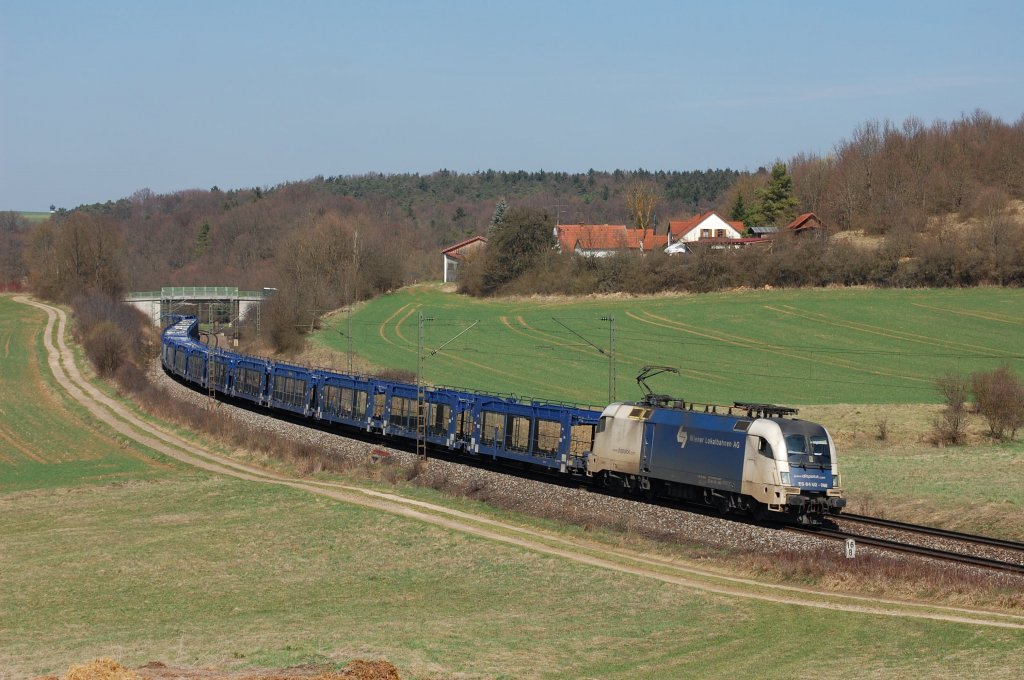 ES 64 U2 068 am 02.04.2011 mit leerem Autozug bei Edlhausen