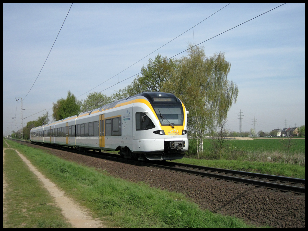 ET 7.03 der eurobahn als RE13 auf dem Weg nach Viersen und Hamm bei Dlken.