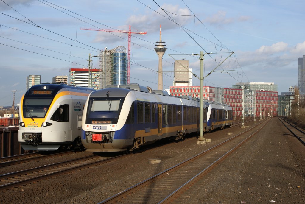Eurobahn ET 7.03 als RE 13 nach Mnchengladbach und NWB VT 575 als RE 10 nach Dsseldorf Hbf treffen sich in Dsseldorf-Hamm am 27.02.2010 um 16:53 Uhr 