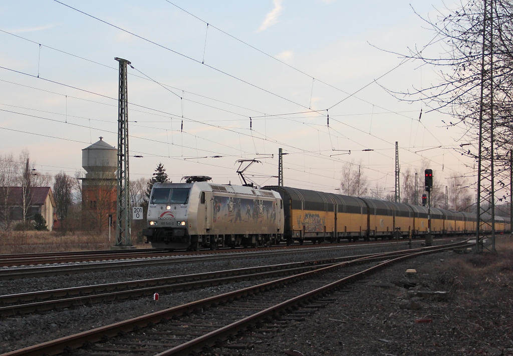 Gleiche Lok, gleiche Stelle ein paar Tage spter mit anderem Zug: 185 540-2 mit geschlossenen ARS Autotransportwagen in Fahrtrichtung Norden. Aufgenommen am 02.03.2012 in Eschwege West.