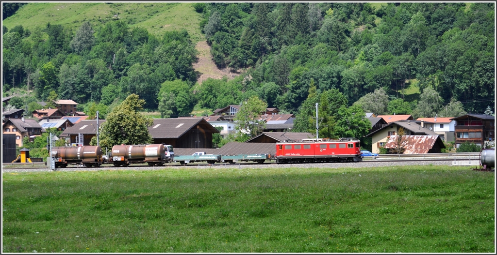 Gterzug mit der Ge 6/6 II 701  Raetia  bei Schiers. (05.07.2012)