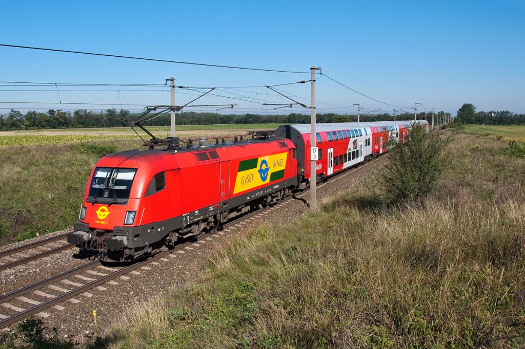 GySEV 1116 058 ist mit REX 7614 nach Wien Sdbahnhof (Ostseite) unterwegs. Gramatneusiedl, am 20.08.2012.