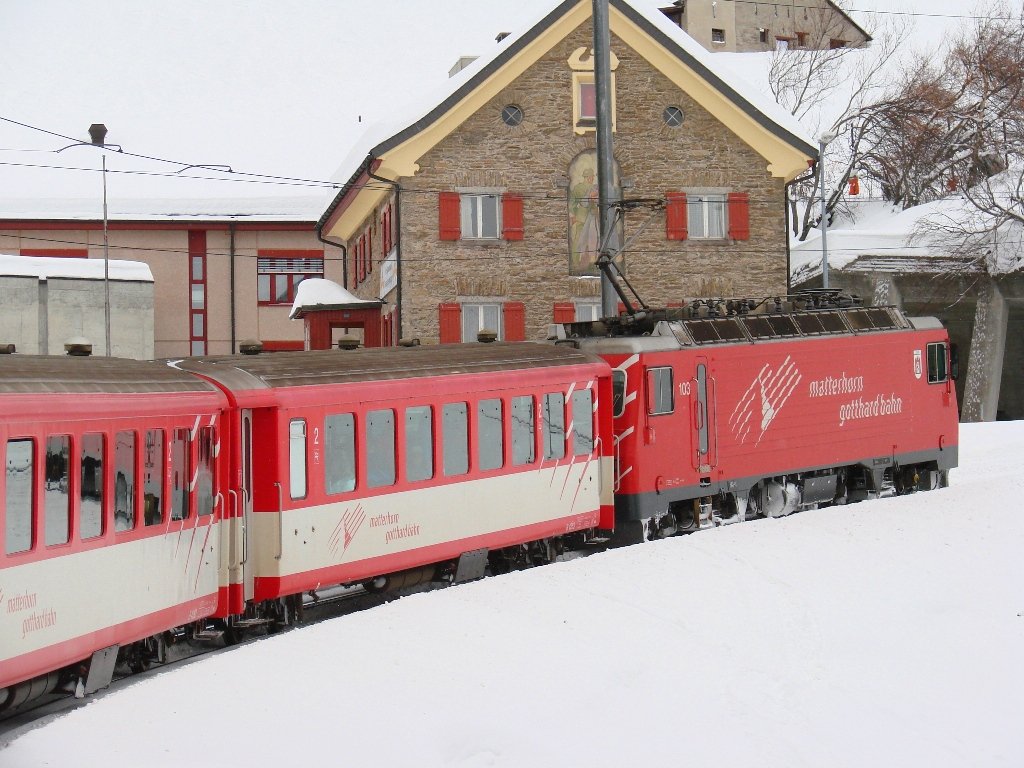 HGe 4/4 II 103 - Abfahrt von Andermatt im richtung Oberalppass - 03-02-2010