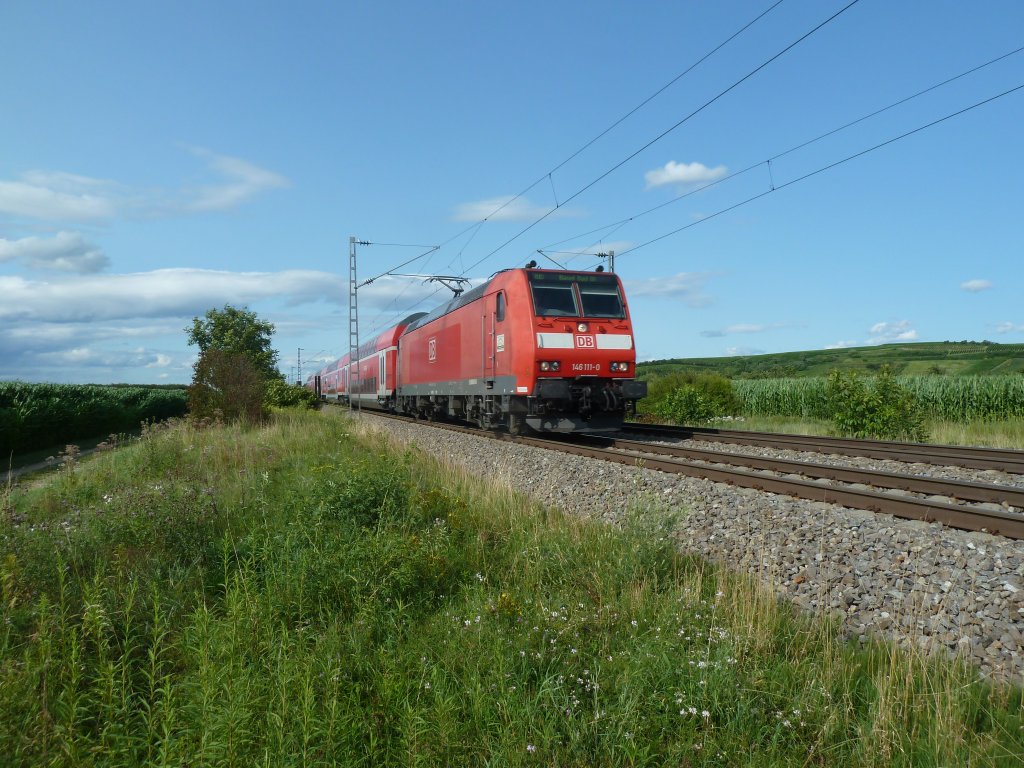 Hier ist 146 111-0 mit ihrem RE kurz vor Mllheim (Baden). (14.07.2012)