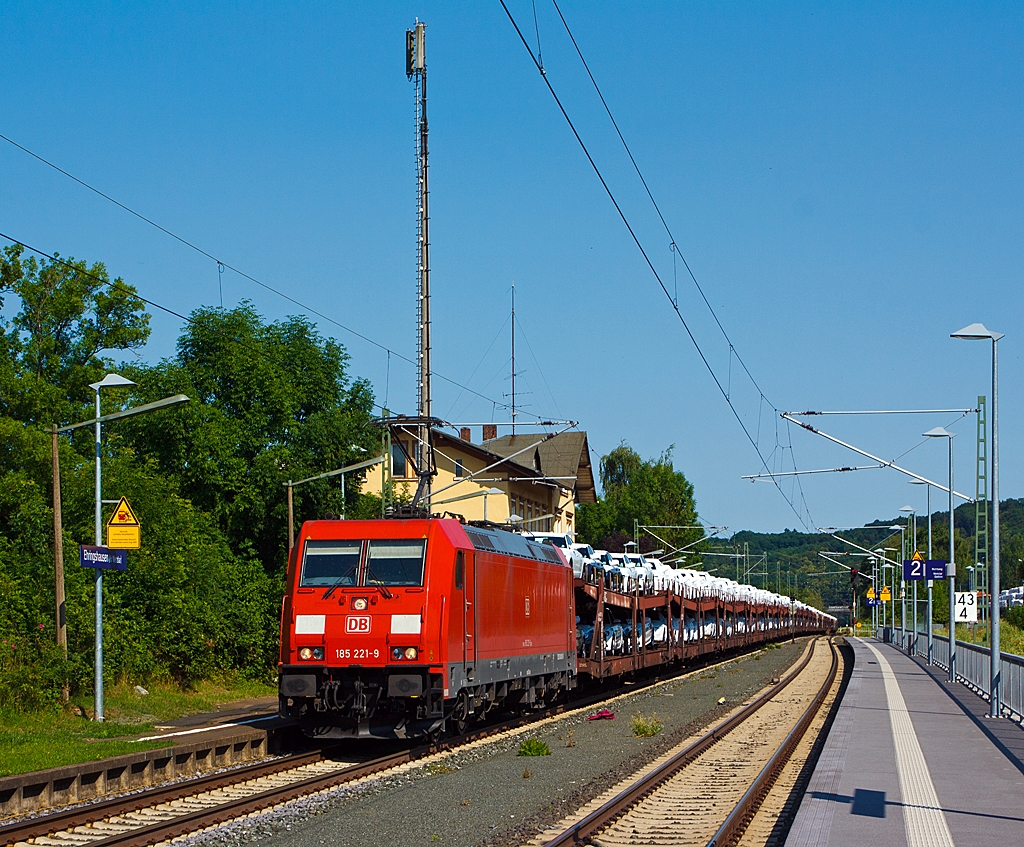 Hier hat wohl die Ladung mehr Leistung als die Lok mit 5600 kW (7200 PS)
185 221-9 der DB Schenker Rail (eine Bombardier TRAXX F140 AC2) zieht am 07.07.2013 einen sehr langen Autozug (mit Neuwagen der Marke mit den vier Ringen) durch den Bahnhof Ehringshausen (Kr. Wetzlar). 
Die Lok wurde 2005 bei  Bombardier in Kassel unter der Fabriknummer 33745 gebaut.