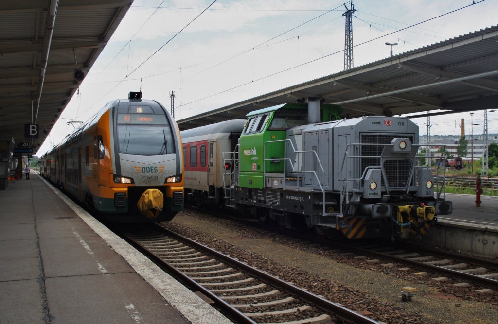 Hier links 445 103-5 als RE2 (RE92362) von Berlin Lichtenberg nach Cottbus und rechts 650 107-2 mit dem CNL1246 von Mnchen Ost nach Berlin Lichtenberg, diese beiden Zge begegneten sich am 23.6.2013 in Berlin Lichtenberg.