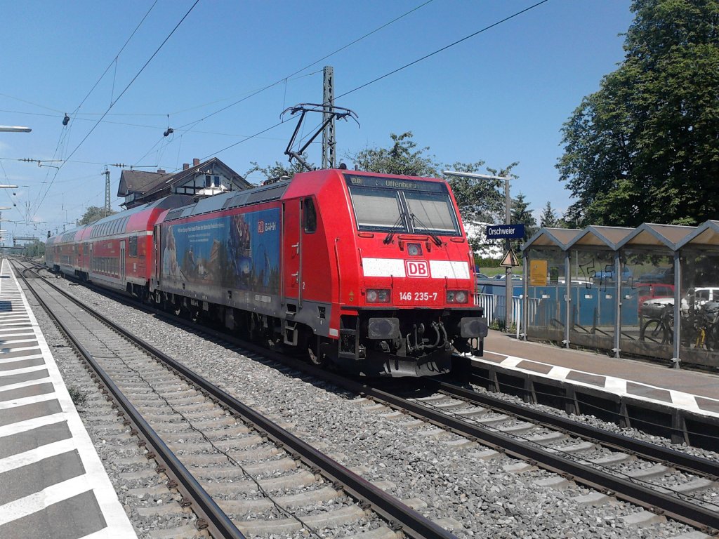 Hier schiebt 146 235-7 (Europa-Park) einen RB nach Offenburg. Hier bei der Ausfahrt in Orschweier. (28.05.2012)