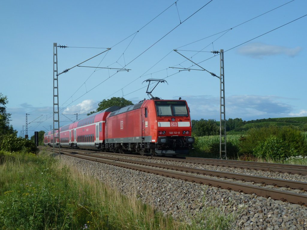 Hier schiebt am 14.07.2012 die Freiburger 146 112-8 einen RE von Basel Bad Bf nach Offenburg. 