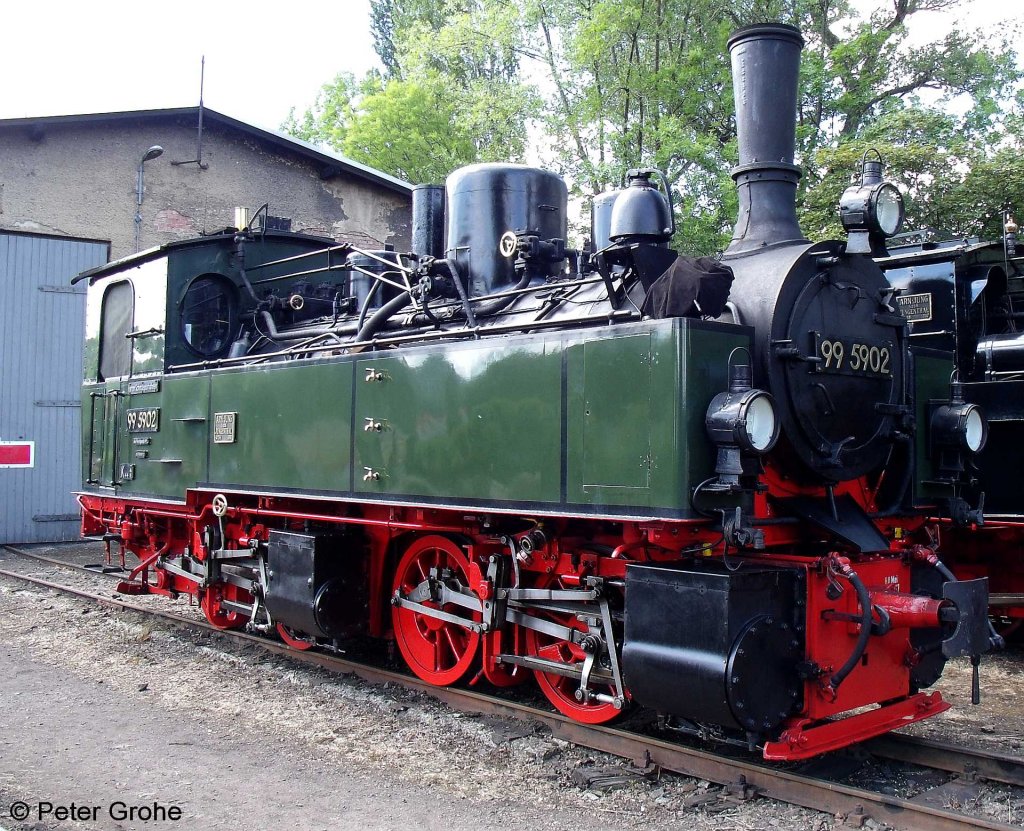 HSB 99 5902 zur Jubilumsveranstaltung   125 Jahre Schmalspurbahnen im Harz  , Harzer Schmalspurbahnen, Harzquer- und Brockenbahn, fotografiert am Lokschuppen in Wernigerode-Westerntor am 09.06.2012 --> die Traditionslok der HSB wurde von der Firma Arnold Jung GmbH Jungenthal mit der Nummer 261 im Jahr 1898 gebaut 

 