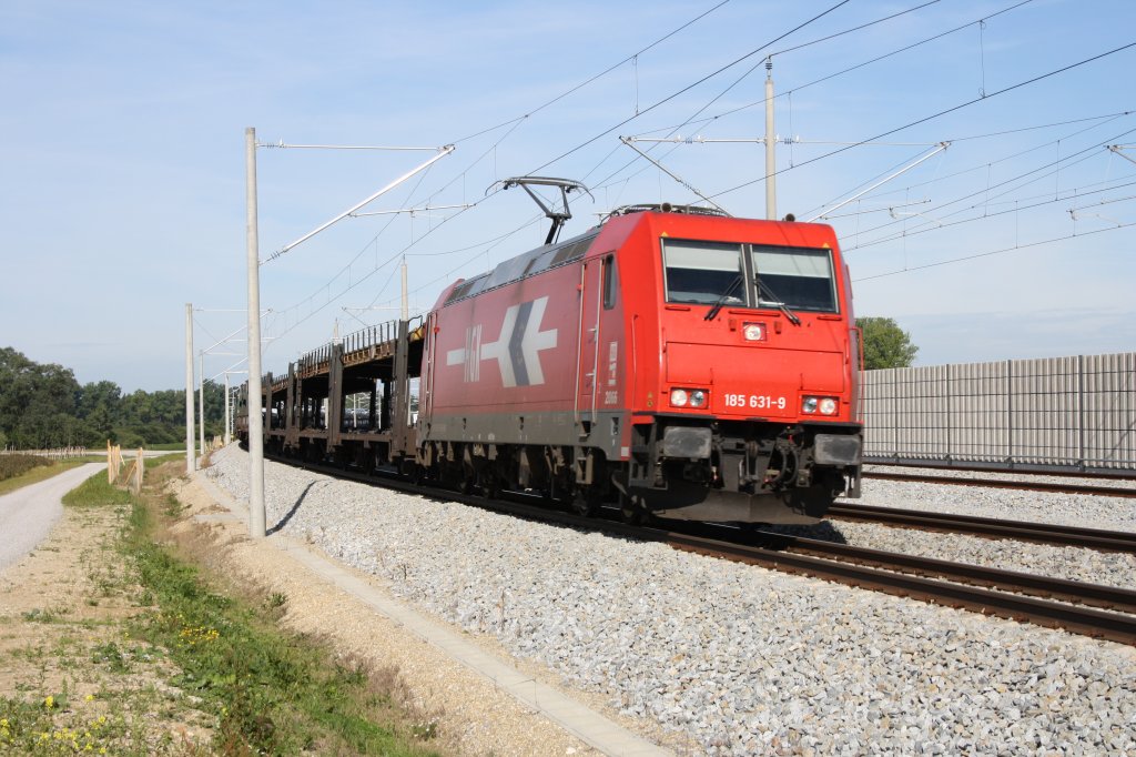 Im sch�nsten Sonnenlicht kam 185 631-9 Richtung M�nchen in Hattenhofen durch. Aufnahmedatum war der der 12.08.2011