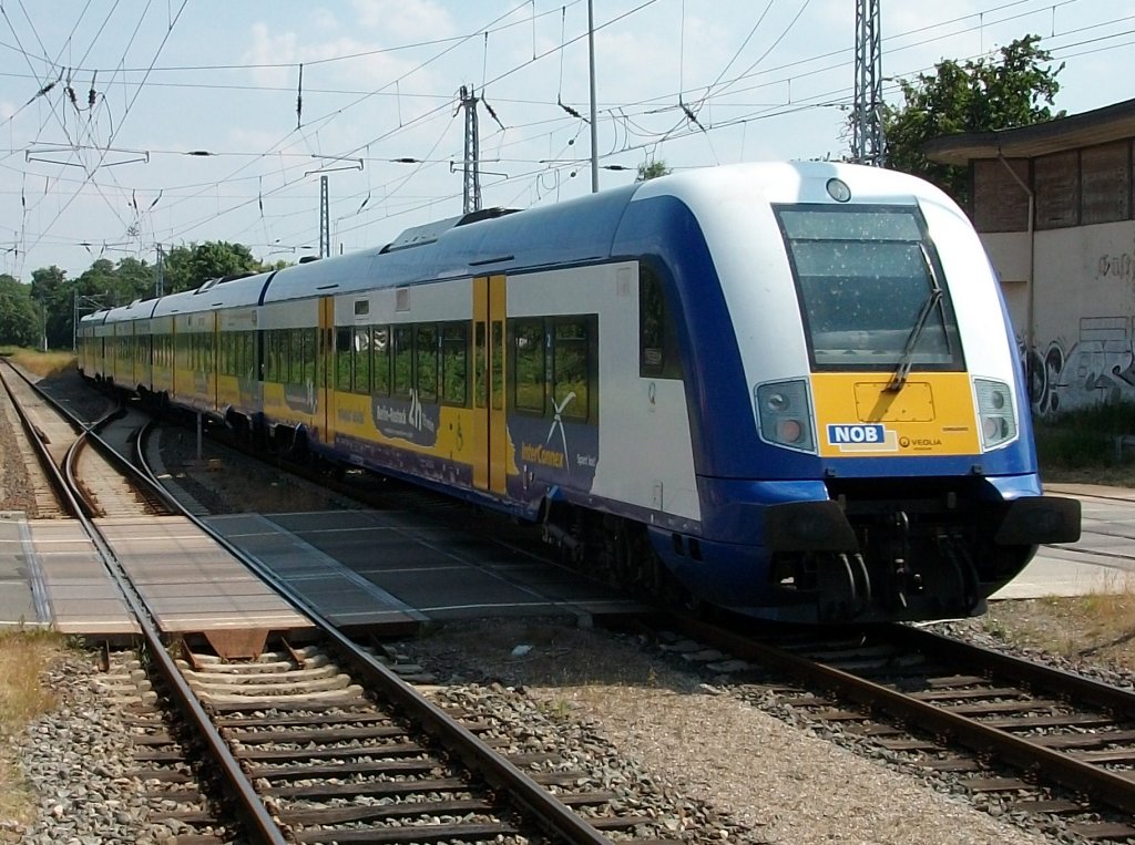InterConnex X80004 Warnemnde-Leipzig Hbf bei der Ausfahrt aus Gstrow am 03.Juli 2010.