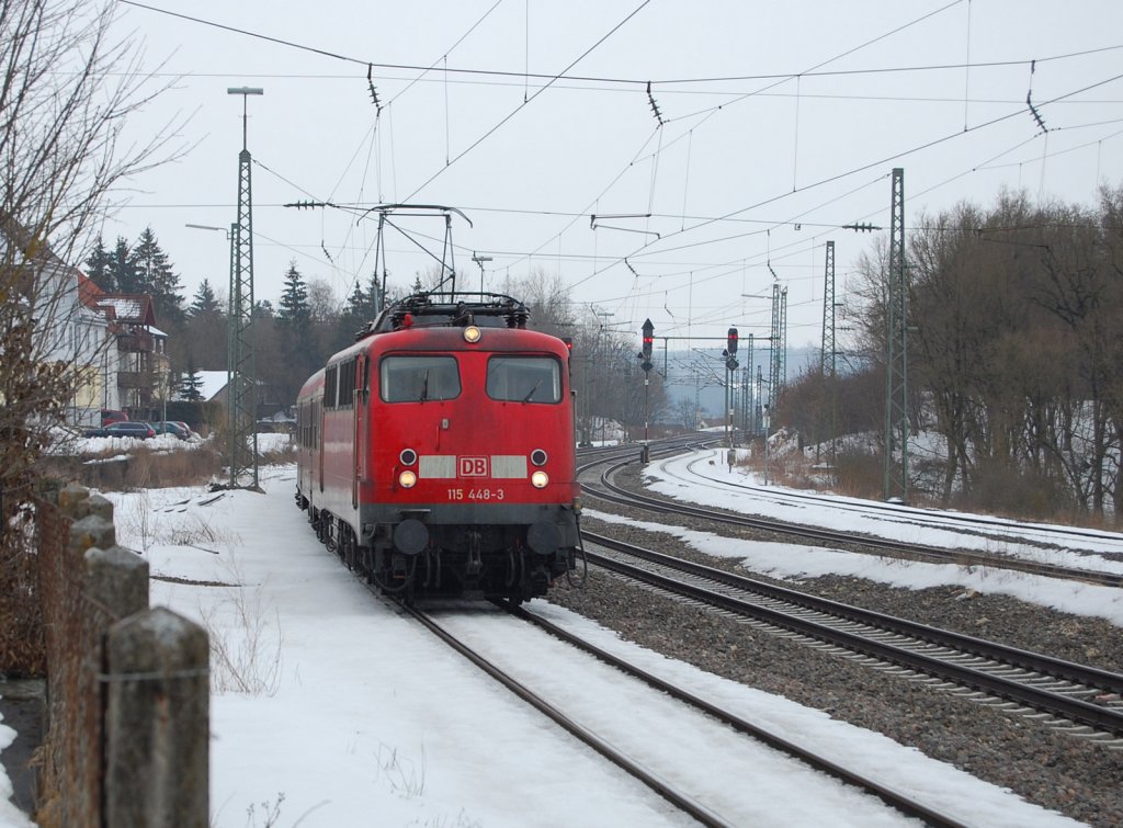  Jagdglck  in Westerstetten (1): 115 448-3 fhrt am 19.2.2010 mit dem Pbz 1960 (MPB - TS) in den alten Westerstetter Bahnhof ein, um dort eine berholung abzuwarten.