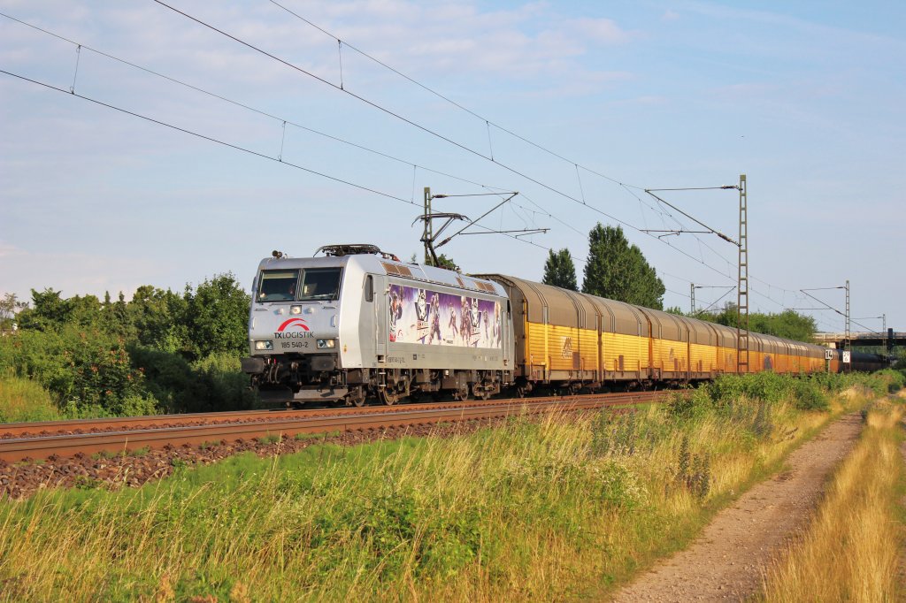 KBS 350 bei Burgstemmen am 04.07.2012 - TXL 185 540  Kassel Huskie  mit einem ARS-Altmann-Zug in Richtung Bremerhaven.