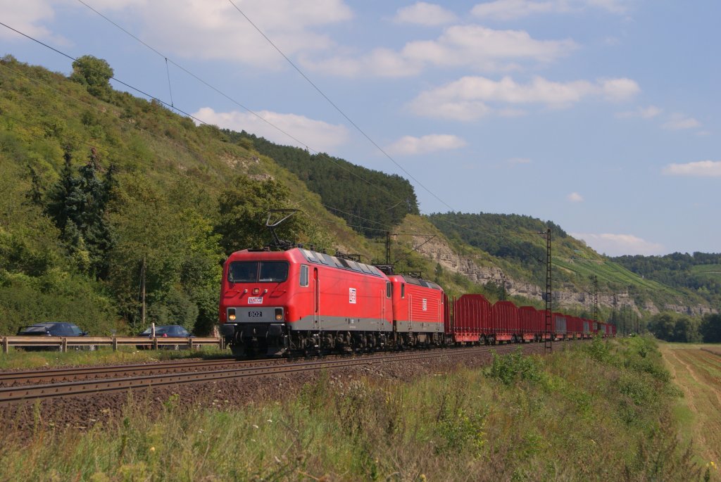 MEG 802 + MEG 60x mit einem leeren Holzzug in Karlstadt am Main am 17.08.2011