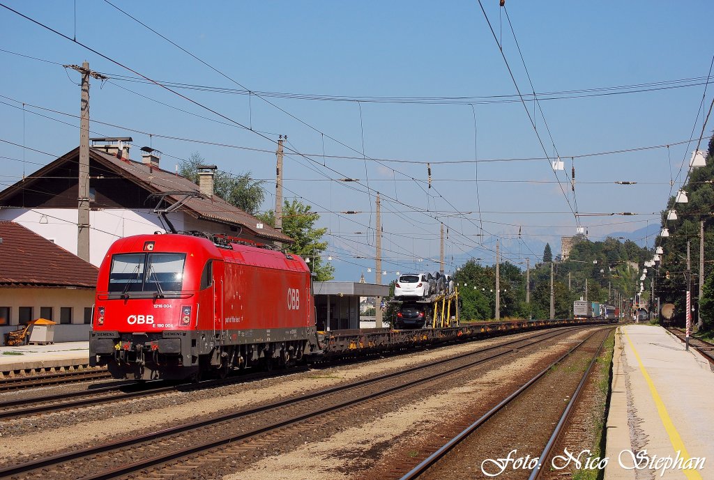 Mit Werbung wrs noch schner...Ex-Italien-Lok 1216 004-2 mit drftig ausgelasteter RoLa ist zum Brenner unterwegs,Brixlegg (sterreichurlaub 20.08.09)