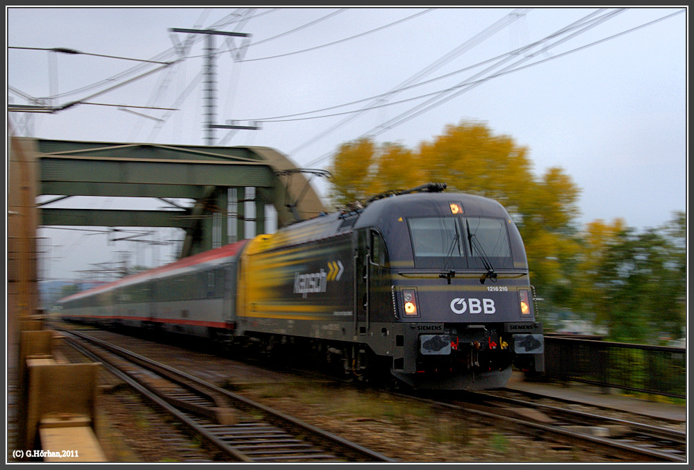 Mitzieher von 1216 210 Kapsch mit EC 78 in Wien-Erdberger Lnde, 27.10.2011