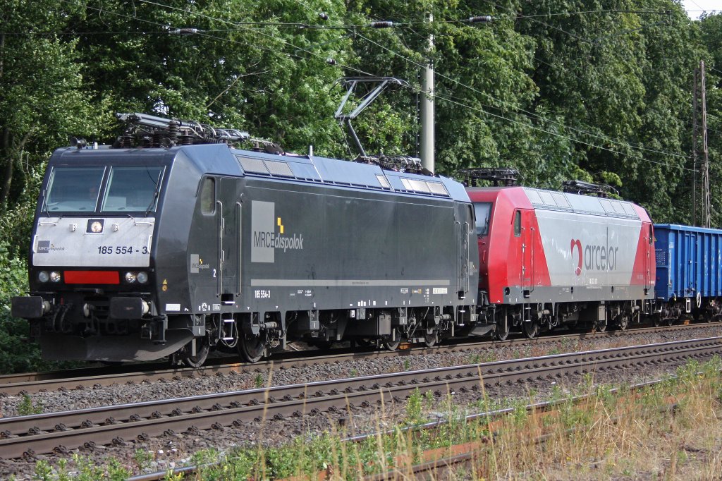 MRCE 185 554 zog am 17.7.10 Arcelor 145 CL-001 und Gz durch Ratingen-Lintorf
