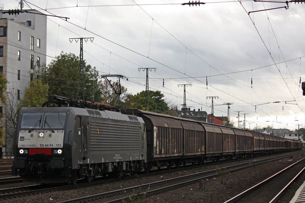 MRCE Dispolok/CTI ES 64 F4-111 am 4.11.12 mit einem Papierzug in Kln-West.
