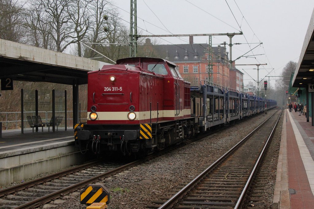 Muldental Eisenbahnverkehrsgesellschaft mbH 204 311-5 kommt mit Mosolf Autowagen aus Cuxhaven am 26.02.2013 bei der Durchfahrt im Bahnhof Stade.
Weitere Bilder auf Bahnfotokiste.com 