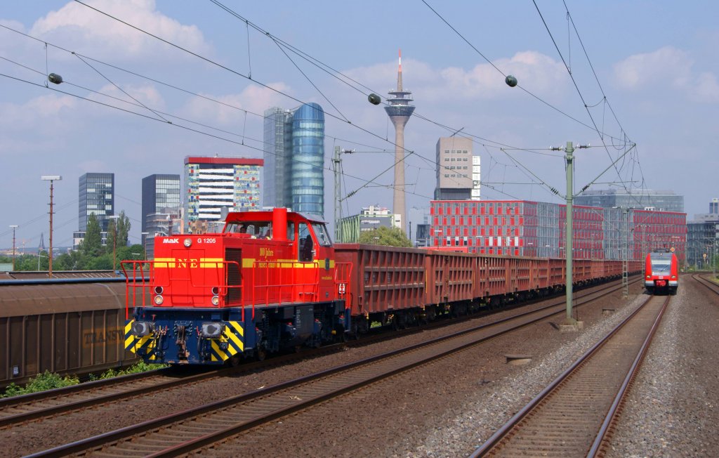 Neusser Eisenbahn MaK G1206 mit einem Gterzug in Dsseldorf-Hamm am 30.05.2012