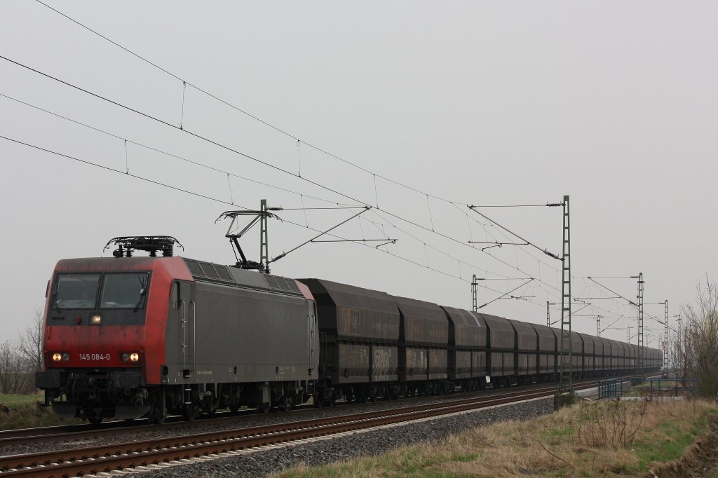 Niag Mietlok 145 084 (ex ITL 482 002) am 17.3.12 mit dem Niagkohlezug bei der Durchfahrt durch Neuss-Allerheiligen.