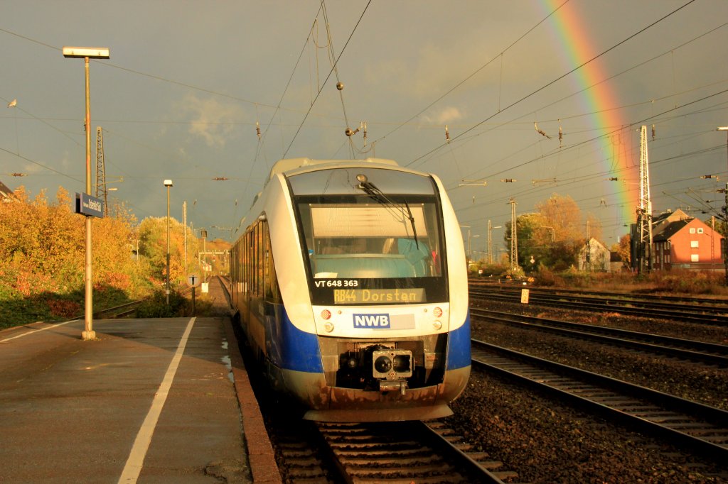 NordWestBahn NWB VT 648 483 mit einem Regenbogen im Hintergrund am 04.11.2012 in Oberhausen Osterfeld Süd.