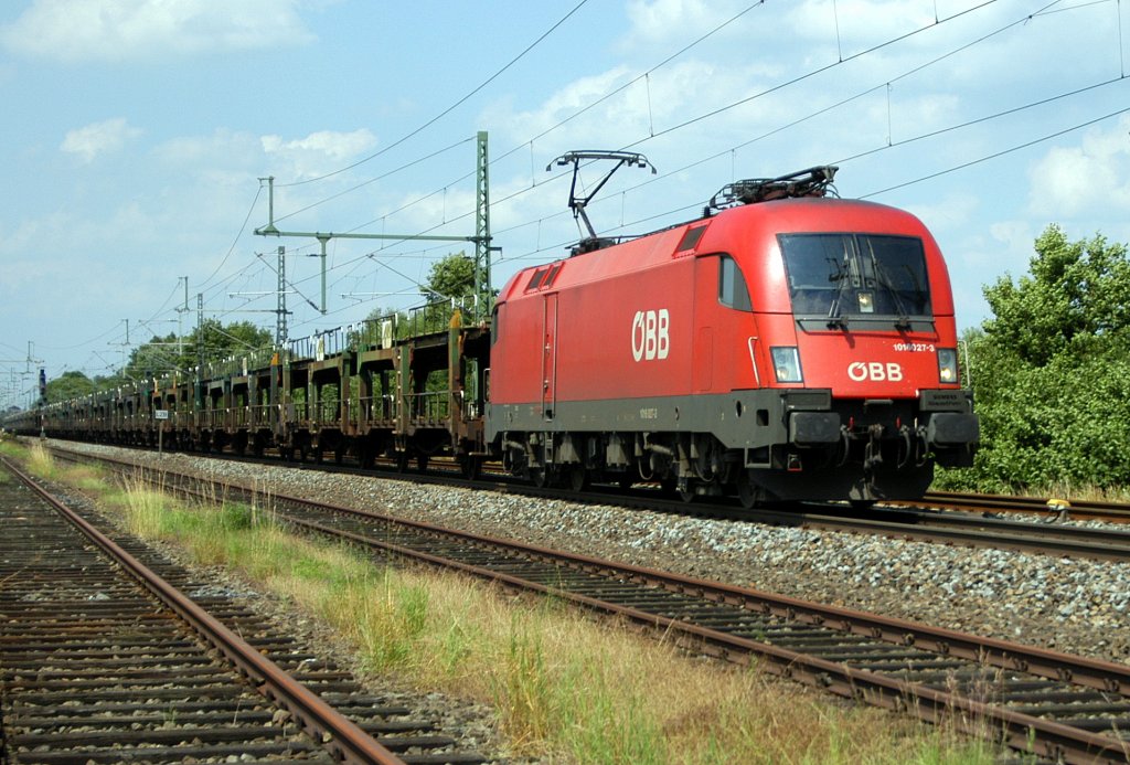 BB 1016 027 mit einem leeren Autotransportzug in Richtung Osnabrck (Diepholz, 30.06.12). 