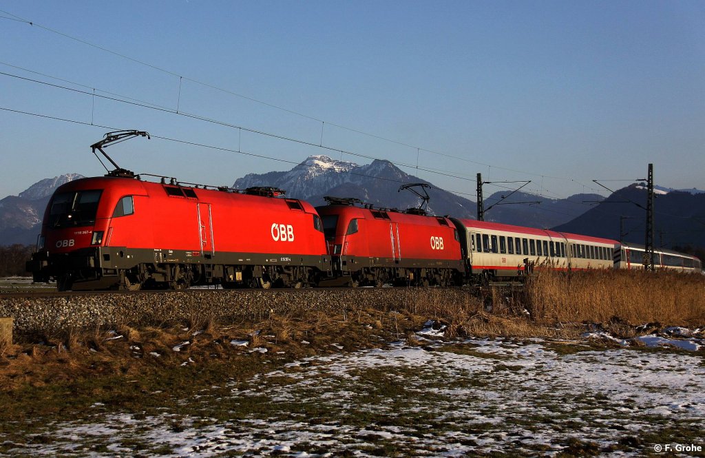 BB 1116 267-4 + 1116 276-5 vor BB EC 166 Wien-Zrich, KBS 951 Mnchen - Rosenheim - Salzburg, fotografiert bei Weisham im letzten Abendsonnenschein am 25.02.2011