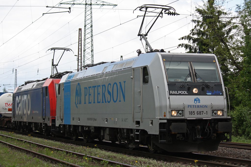 Railpool/RTB 185 687 (ex Peterson) und SBB 482 035 (i.E.fr RTB) im Portrait.
Aufgenommen am 12.5.12 in Ratingen-Lintorf.