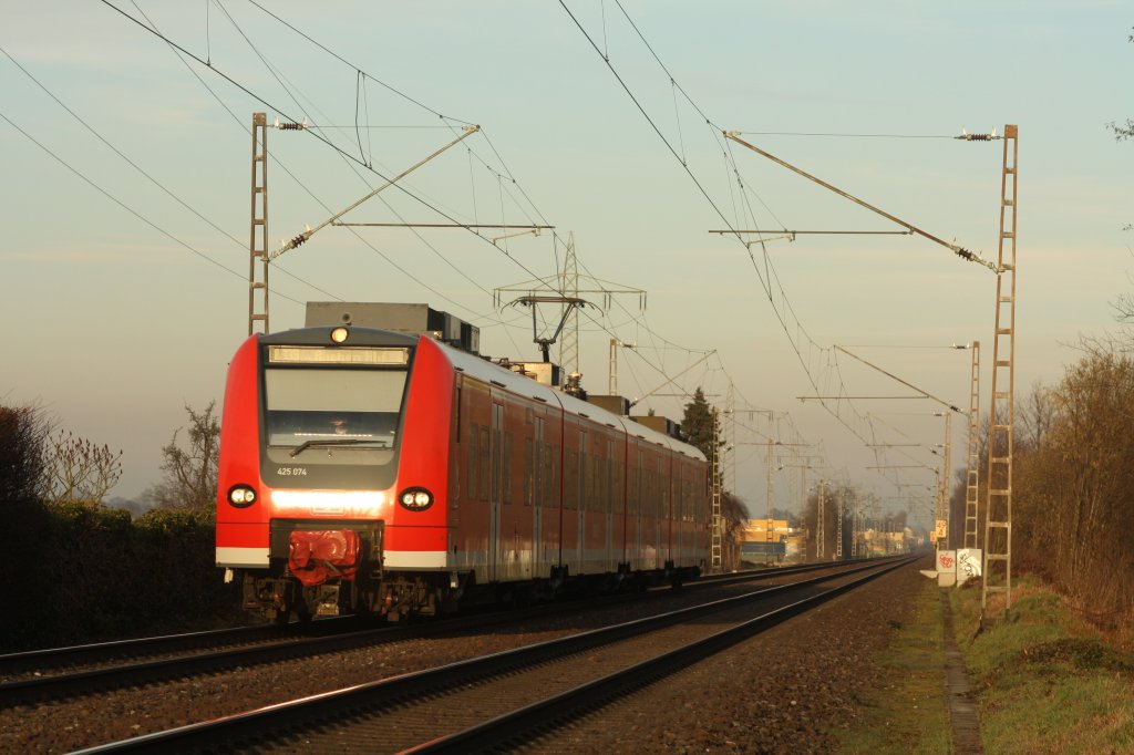 RB 10385 mit 425 074/574 nach Aachen Hbf in Erkelenz Mennekrath am 09.02.11
