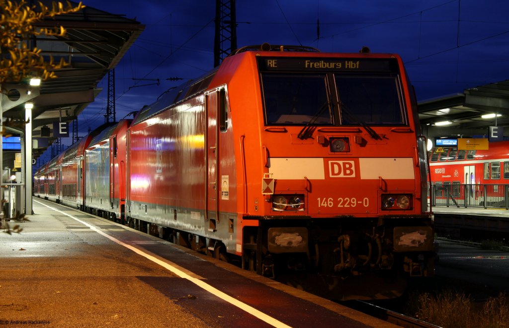 RB 69438 (Freiburg(Breisgau) Hbf-Offenburg) mit Schublok 146 235-7  Europapark Rust  sowie der kalt mitlaufenden 146 229-0 in Offenburg 8.8.11