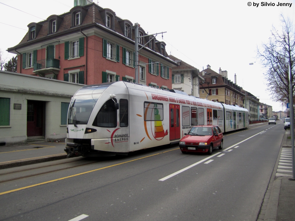 RBe 4/8 46 ''Romande Energie'' am 25.1.2013 bei der Haltestelle Monttan.