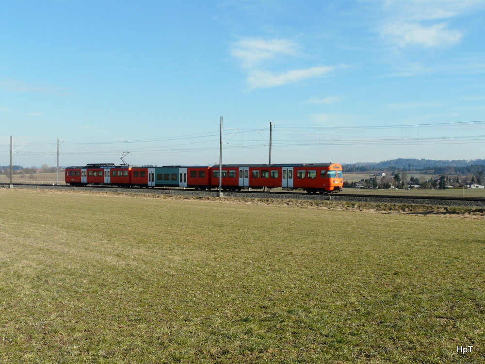 RBS - Regio nach Bern mit dem Triebwagen Be 4/12 51 bei Urtenen 11.02.2011
