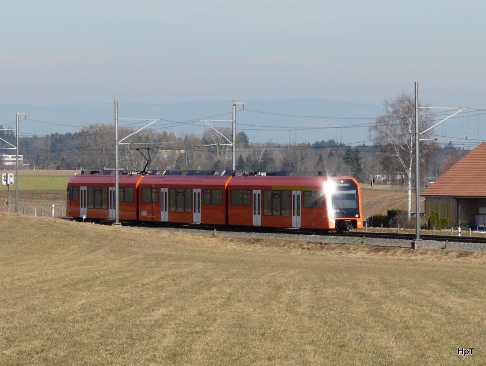 RBS - Schnellzug von Bern nach Solothurn mit dem Triebzug RABe 4/12 25 unterwegs bei Urtenen 11.02.2011

