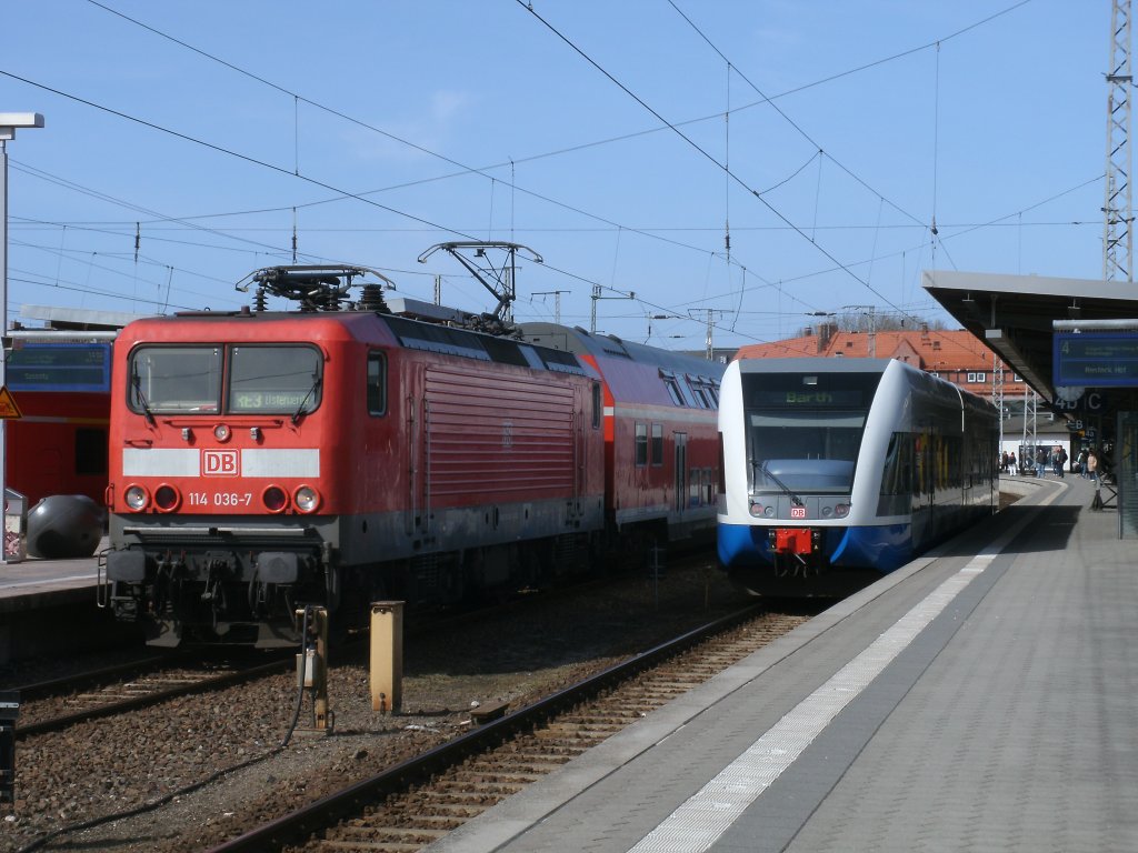 RE 18315 Stralsund-Elsterwerda,gezogen von 114 036 und UBB 646 128  Vintschgau .als RE 29480 nach Barth,am 01.April 2011 in Stralsund.