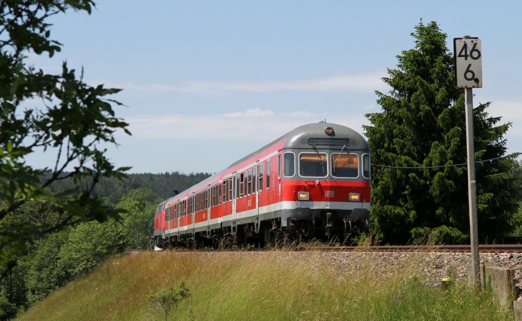 RE 22304 (Neustadt(Schwarzw)-Rottweil) mit Schublok 218 476-0 bei Rtenbach 16.6.12