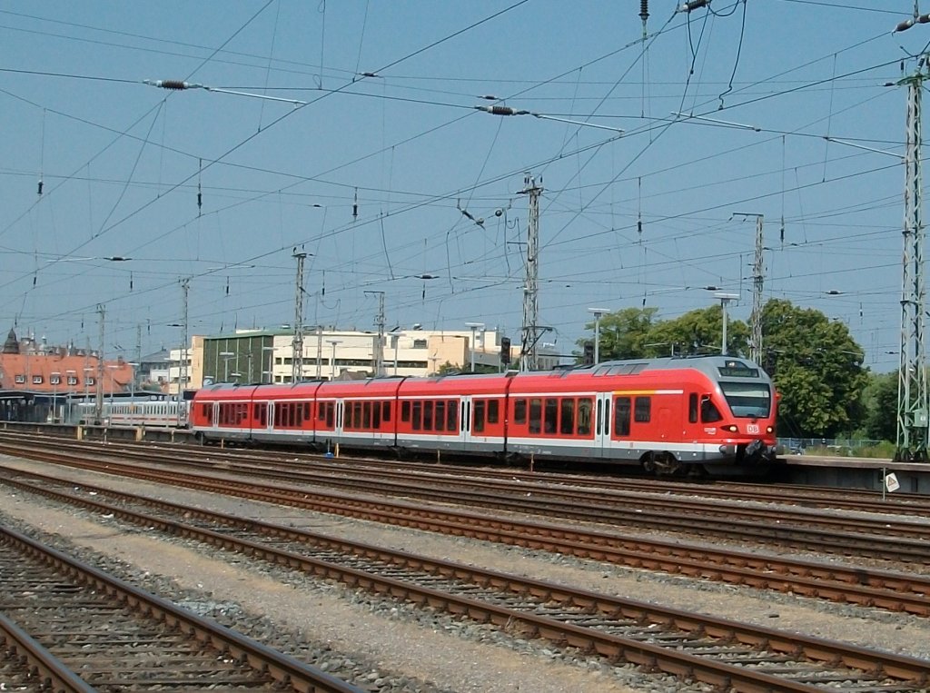 RE 33213 Rostock-Sassnitz der,am 09.Juli 2010,von 429 026 gefahren wurde,bei der Ausfahrt aus Stralsund.