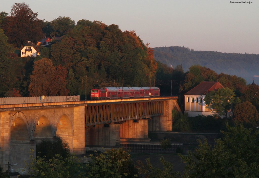 RE 4250 (Mnchen Hbf-Nrnberg Hbf) mit Schublok 111 *** in Regensburg Prfening 30.9.11. Das Bild entstand aus dem DB Gstehaus noch vor dem Frhstck ;-)