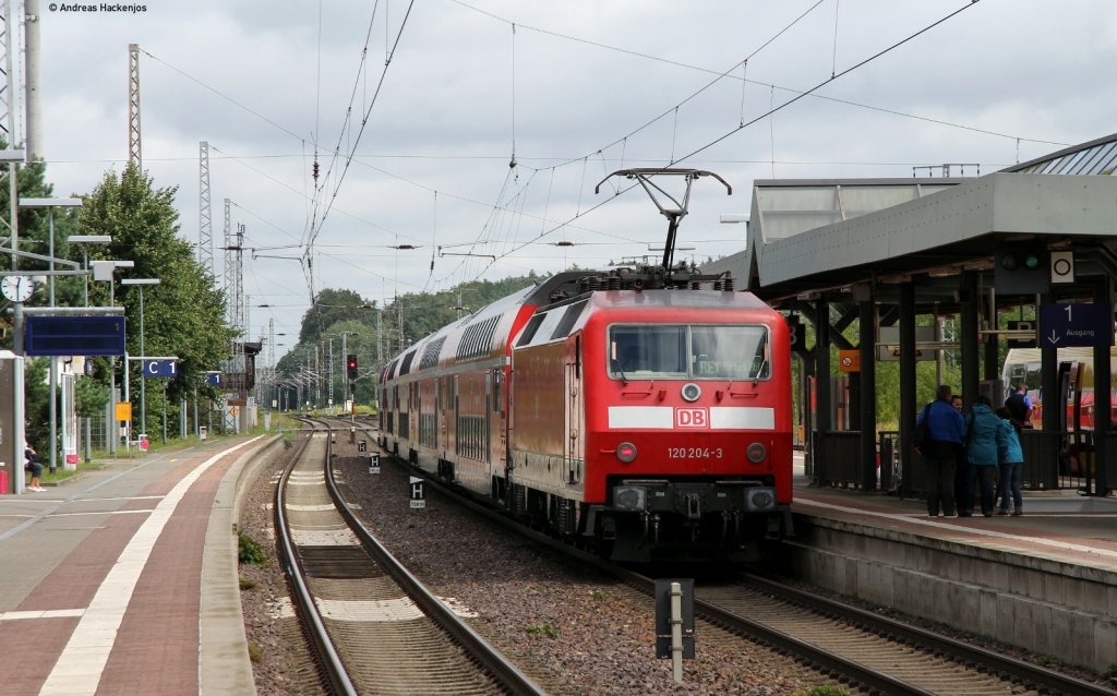 RE 4309 (Hamburg Hbf-Rostock Hbf) mit Schublok 120 204-3 in Btzow 9.8.11
