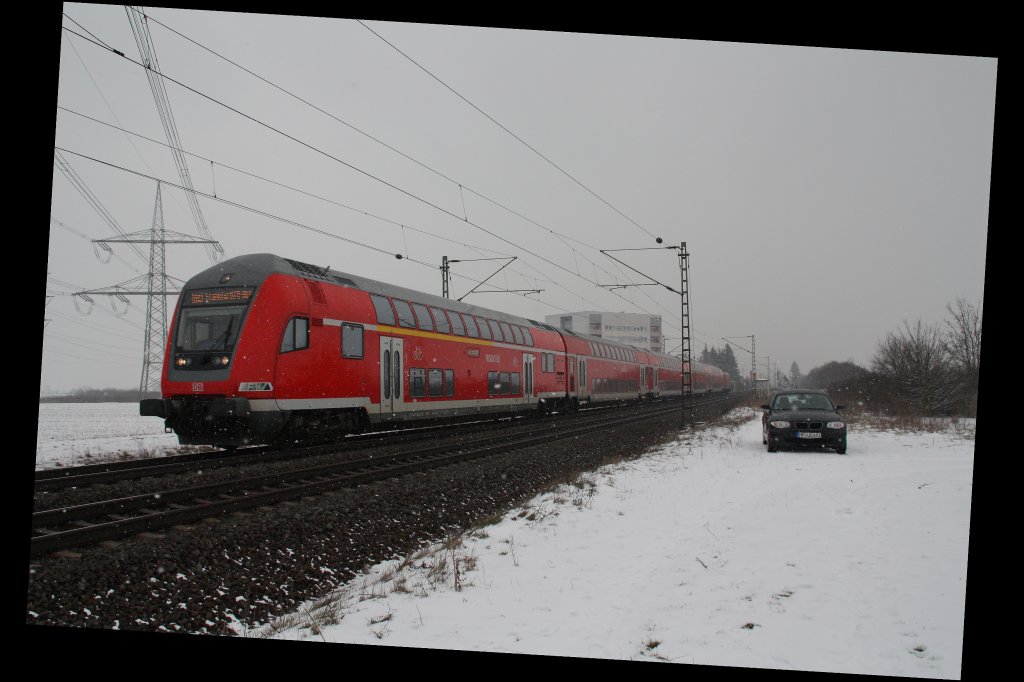 RE von Mannheim Hbf nach Frankfurt(Main)Hbf.Am 14.02.10 in Lampertheim.