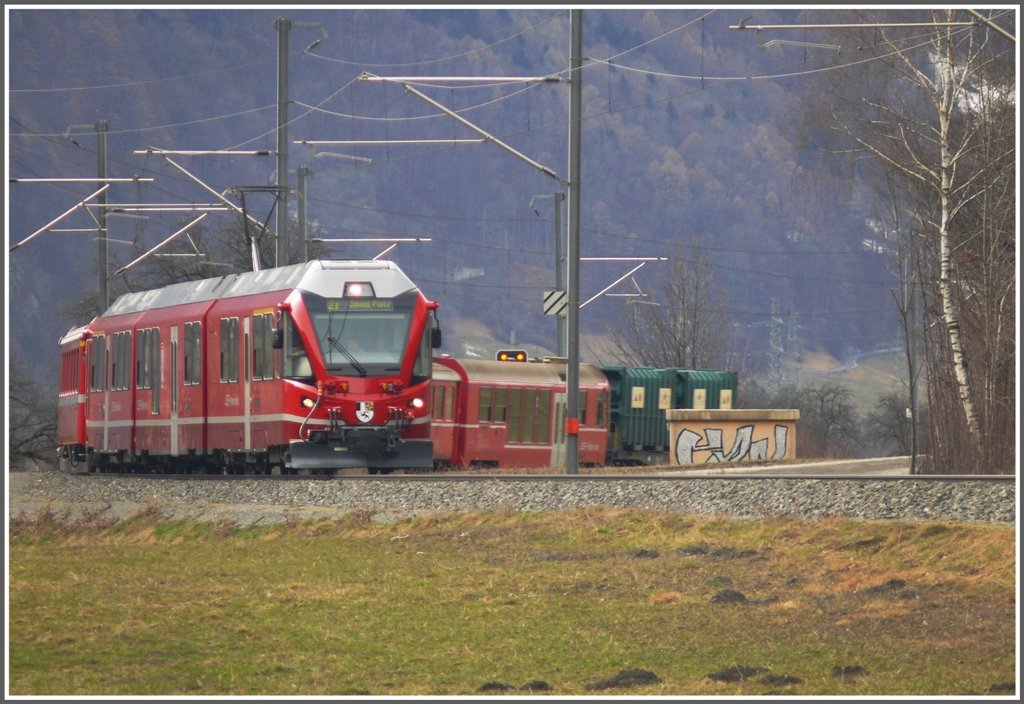 RE1049 nach Davos Platz mit ABe 8/12 3502 bei Malans. (18.03.2010)