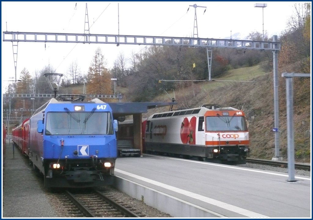 RE1149 nach St.Moritz mit Ge 4/4 III 647  Grsch  begegnet in Filisur R1830 nach Davos Platz mit Ge 4/4 III 641  Maienfeld . (11.11.2009)